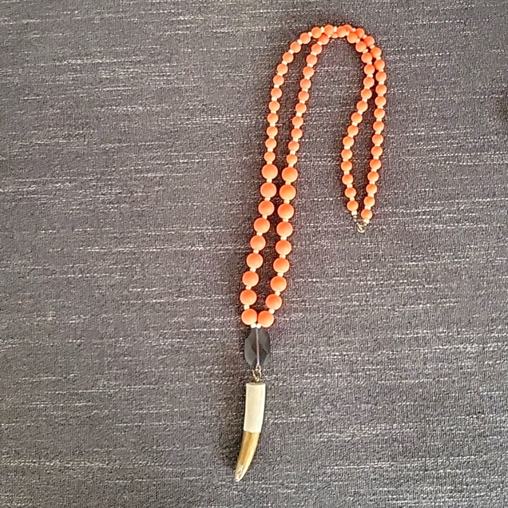 Orange Beaded Necklace with Horn Pendant